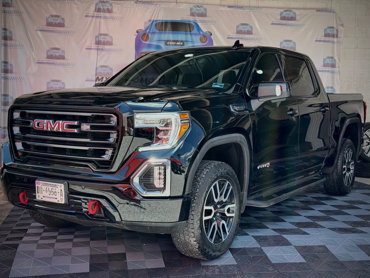 E. 2021 GMC SIERRA AT4 30,000KMS