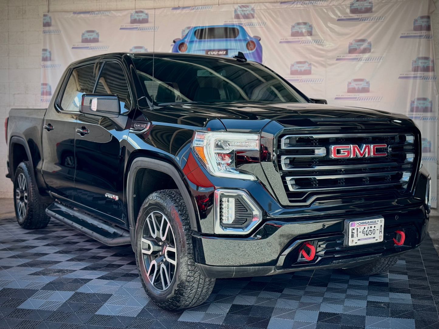 E. 2021 GMC SIERRA AT4 30,000KMS