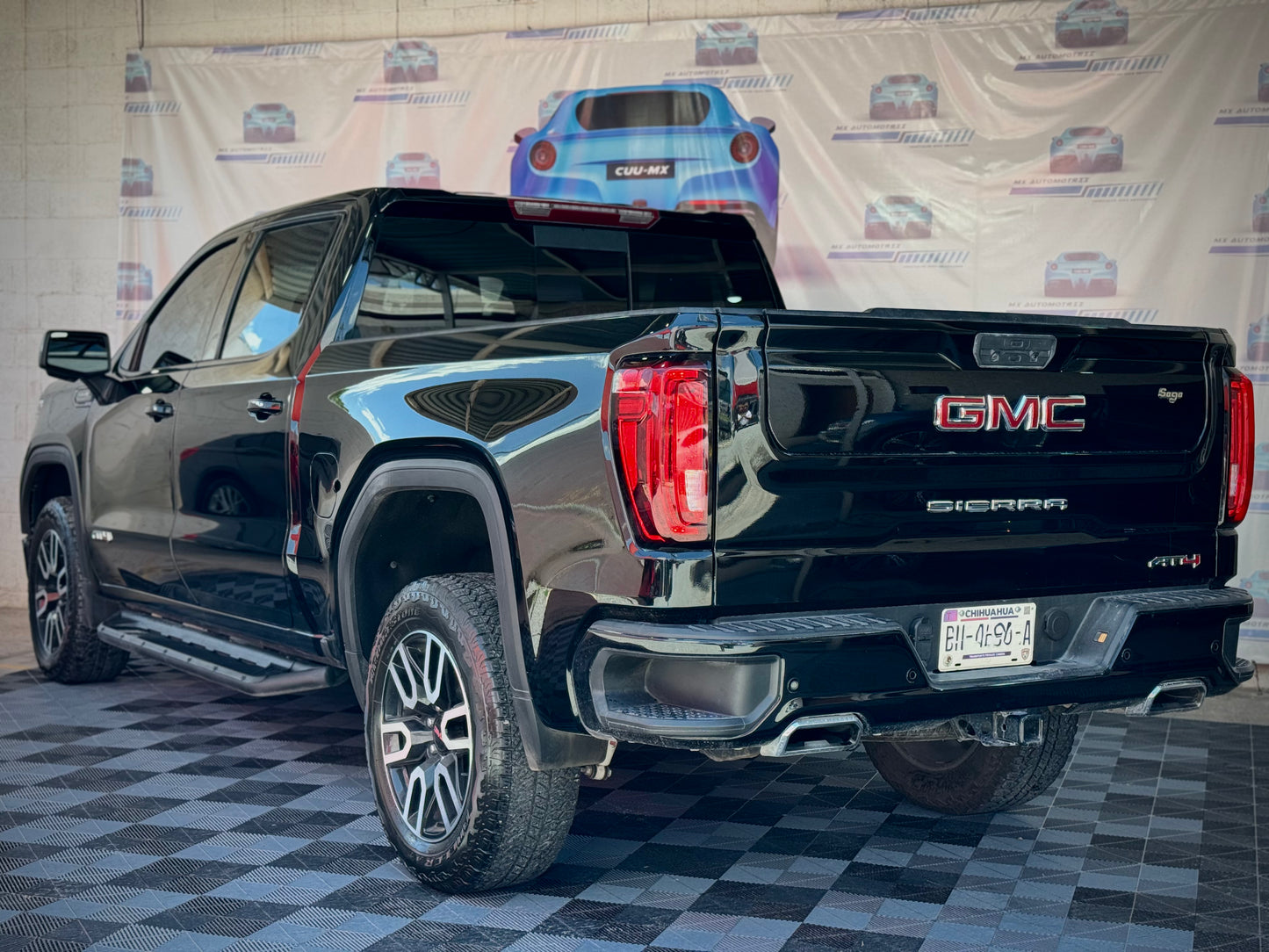 E. 2021 GMC SIERRA AT4 30,000KMS