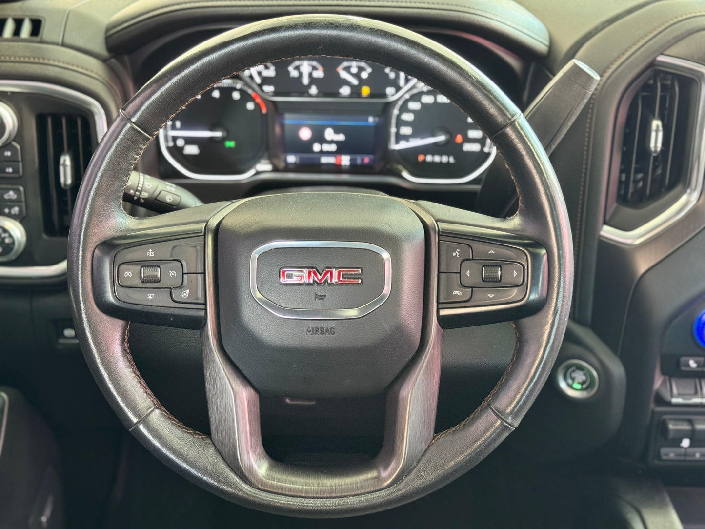 E. 2021 GMC SIERRA AT4 30,000KMS
