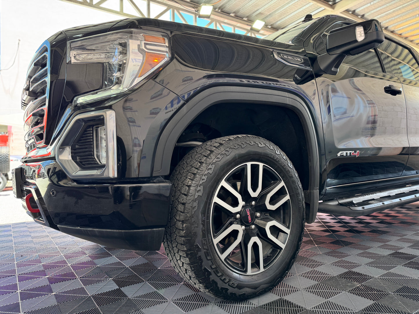 E. 2021 GMC SIERRA AT4 30,000KMS