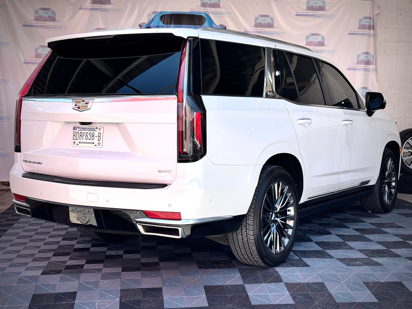 A. 2023 CADILLAC ESCALADE PREMIUM LUXURY
