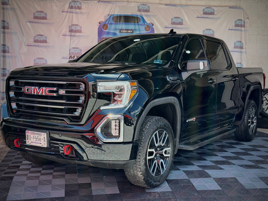 E. 2021 GMC SIERRA AT4 30,000KMS