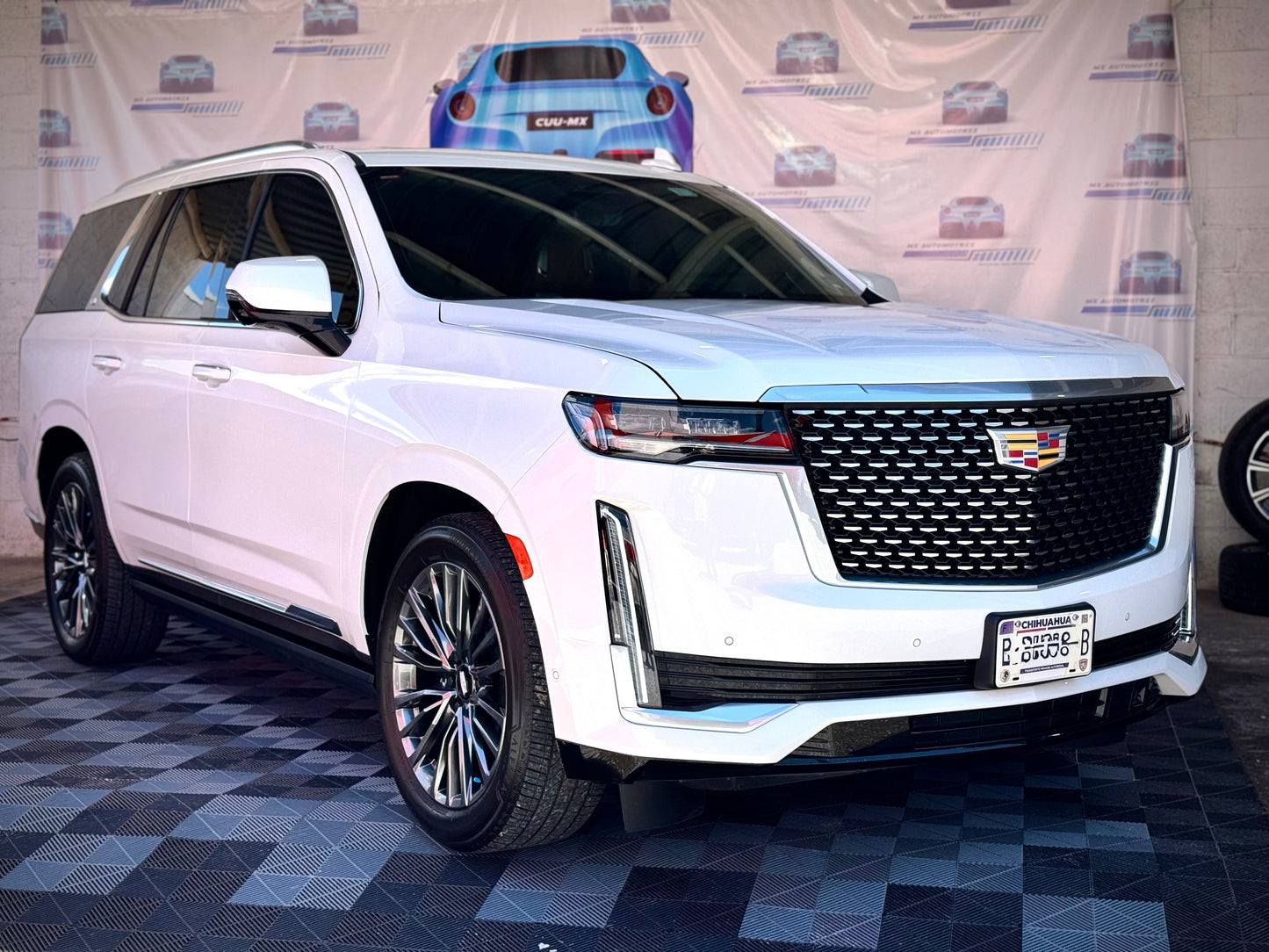 A. 2023 CADILLAC ESCALADE PREMIUM LUXURY