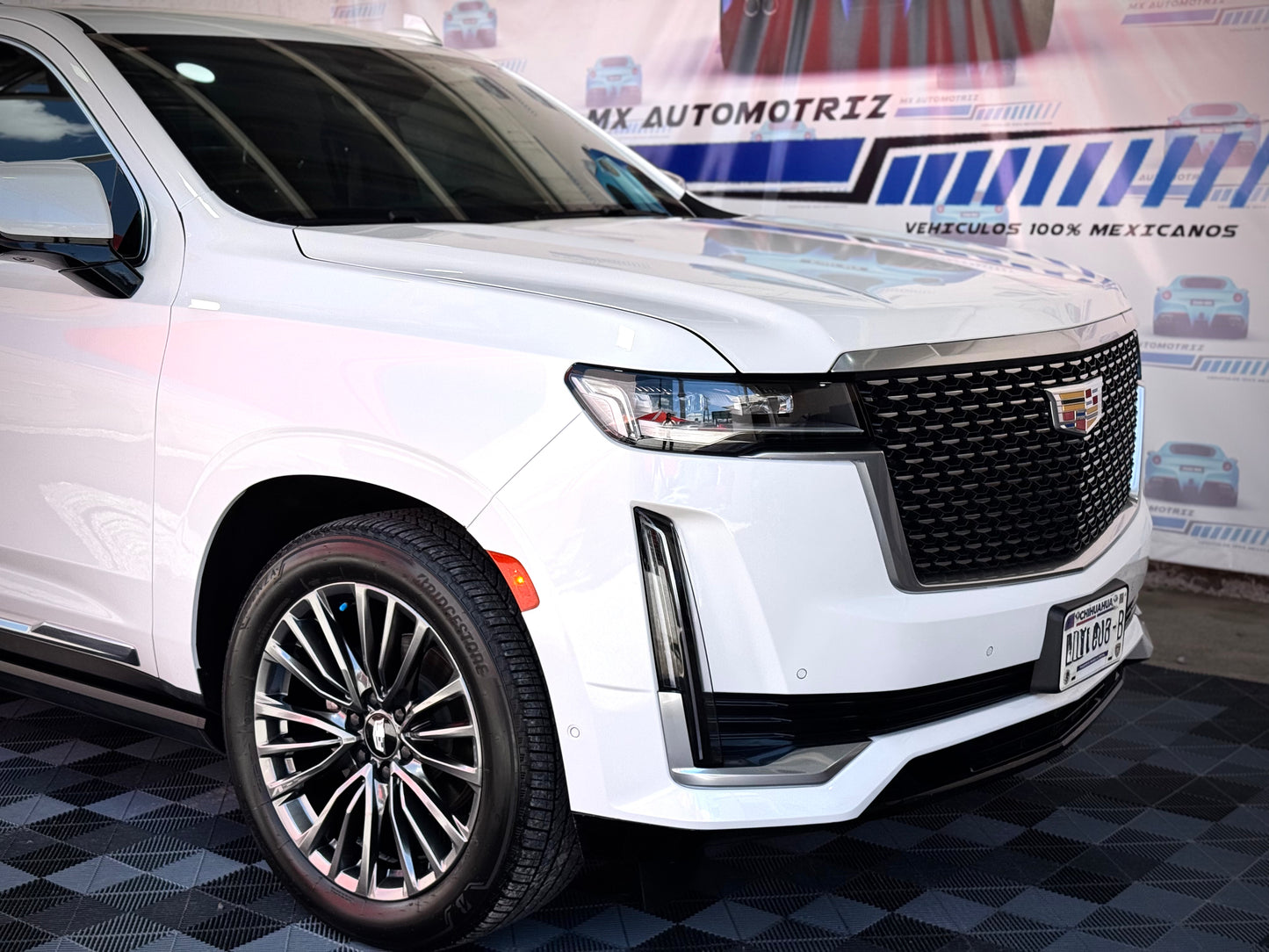 A. 2023 CADILLAC ESCALADE PREMIUM LUXURY